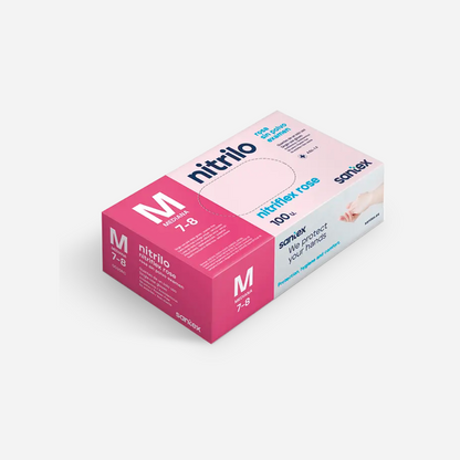 Caja de 100 guantes de nitrilo rosa Nitriflex sin polvo, con un gramaje de 3,5 gramos, diseñados para centros de estética, peluquerías y clínicas dentales en Canarias. Estos guantes son hipoalergénicos y libres de látex, proporcionando un ajuste cómodo y resistencia frente a productos químicos y tintes.