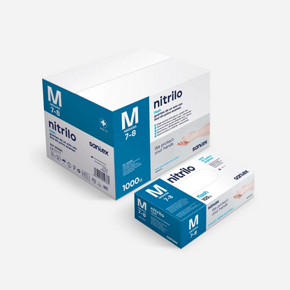 Guantes de nitrilo azul embalados en caja de 100 unidades, diseñados para garantizar protección higiénica en sectores sanitarios, alimentarios y automotrices.