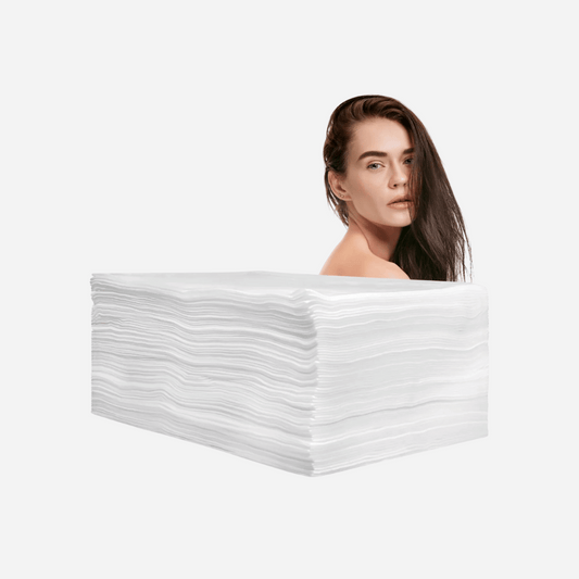 Pack de 100 toallas desechables SpunLace de 40x80 cm para peluquería y estética en Gran Canaria, suaves y de un solo uso.