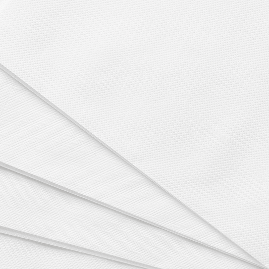 Detalle del gofrado en toalla de papel tissue 40x60 para uñas; alta absorción y mejor agarre en cabina.